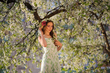 beautiful  woman in a spring garden