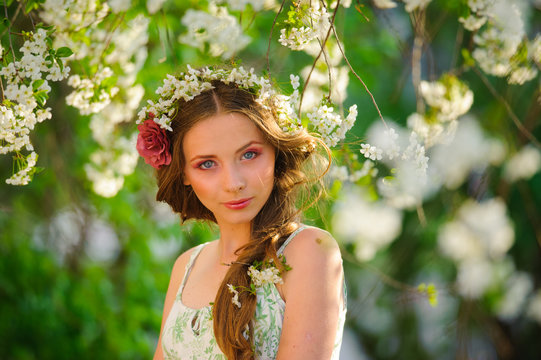 beautiful  woman in a spring garden