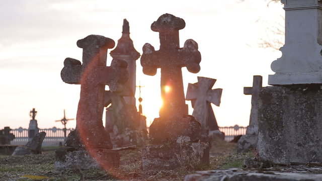 It is very old cemetery. There are many graves from 16 to 21 centuries. It was shot just before sunset therefore some lightflares are very real. Full HD video shot with Canon 6d 25fps and slider.