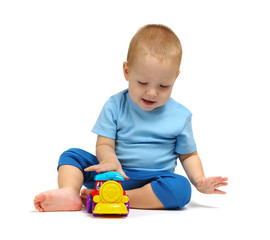 Little boy playing toy