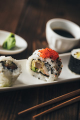 Maki sushi on a wooden table