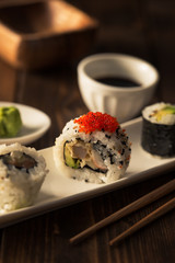Maki sushi on a wooden table