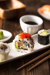 Maki sushi on a wooden table