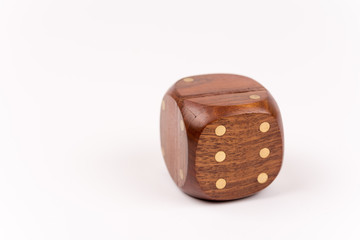 Wooden casino dice isolated on white background