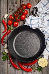 Food background with vegetables and spices. Rustic background. Top view. Copy space.