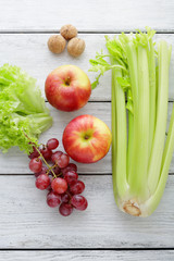 fresh salad ingredients on white boards