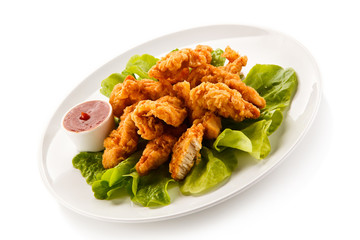 Fried chicken nuggets and vegetables 