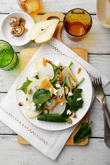 fresh salad with spinach and pear
