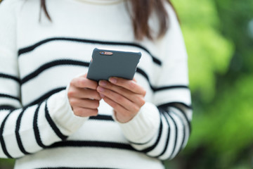 Woman use of mobile phone