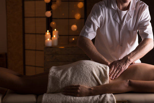 Massage on woman's lumbar spine