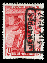 Stamp printed in Belgium shows Box-shipper from The Railway Company at Work issue, circa 1945.