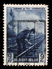 Stamp printed in Belgium shows Railway Worker from The Railway Company at Work issue, circa 1945.