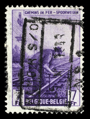 Stamp printed in Belgium shows Railway Worker from The Railway Company at Work issue, circa 1945.
