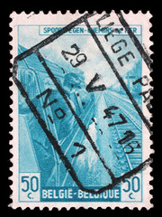 Stamp printed in Belgium shows Engine driver from The Railway Company at Work issue, circa 1945.