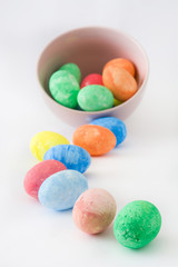 Traditional Easter eggs in a bowl. Isolated photo
