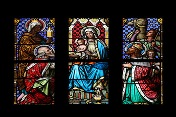 Nativity Scene, Adoration of the Magi, stained glass window in parish church of Saint Mark in...