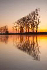Fototapeta na wymiar Reflection on the morning river.