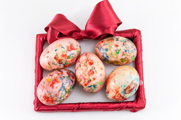 painted easter eggs in a frame