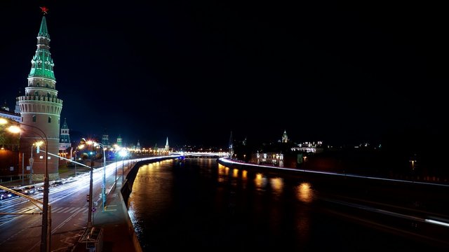 Moscow Kremlin and ships on Moskva river at night. Time-lapse. Full aperture film 4K. September 18, 2014