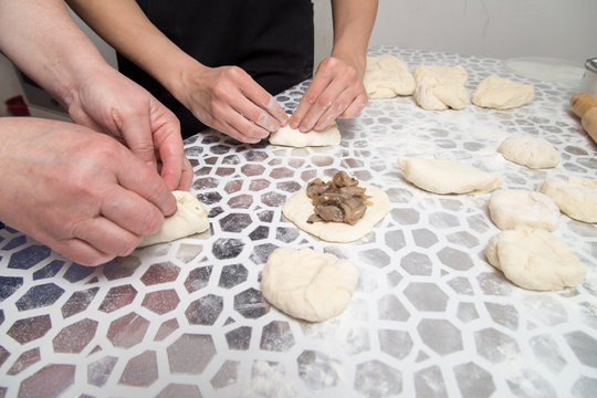 cooking cakes of the dough in the kitchen