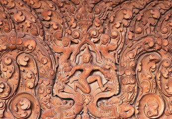 Ancient bas-relief at the temple wall in Angkor Wat, Cambodia.