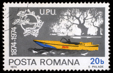 Stamp printed in Romania shows Mail motorboat, Centenary of UPU, circa 1974.