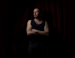 Dramatic portrait of a man in a low key. People