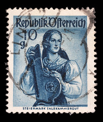 Stamp printed in Austria shows image woman in national Austrian costumes, Styria, Salzkammergut, series, circa 1948