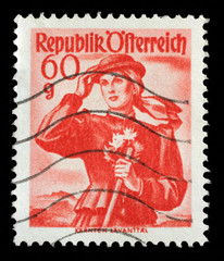 Stamp printed in Austria shows image woman in national Austrian costumes, Carinthia, Lavant Valley, series, circa 1948