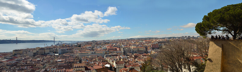 Fototapeta na wymiar Lisbon Panorama from the Castelo de Sao Jorge over the Baixa district toward the Ponte 25 de Abril.