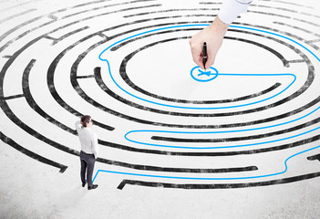 Businessman in front of labyrinth