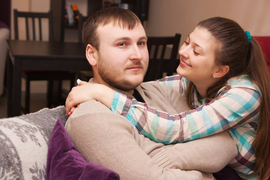 woman comforting her husband
