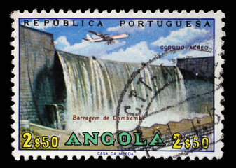 Stamp printed in Angola shows Cambambe Dam, Cambambe Hydroelectric Power Station on Kwanza River, circa 1965