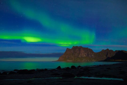 Aurora over the sea at Utakleiv beach, Lofoten Islands, Norway