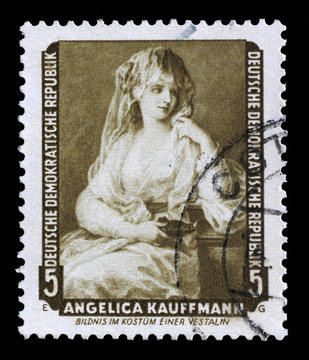 Stamp printed in DDR shows the painting Portrait of a Lady as a Vestal Virgin, by Angelica Kauffmann, from the series Famous Paintings from Dresden Gallery, circa 1957.