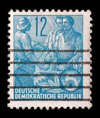 Stamp printed in GDR, shows Farmer, worker, intellectuals, series Five-year plan, circa 1955