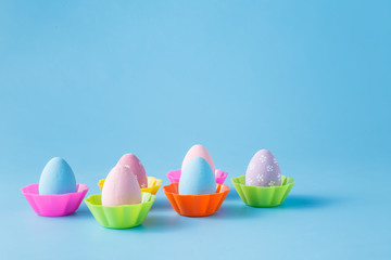 Easter eggs sta on blue bacjground