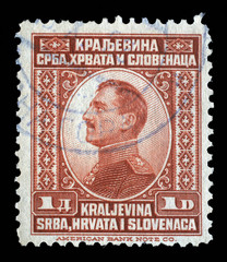 Stamp printed in Yugoslavia (Kingdom Serbia, Croatia and Slovenia) shows portrait of King Alexander...