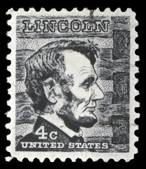 Stamp shows image portrait of Abraham Lincoln the 16th President of the United States of America, circa 1965.