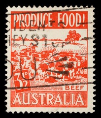 Stamp printed in Australia shows herd of cows, circa