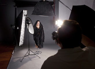 Working conditions in the studio, the photographer photographs t