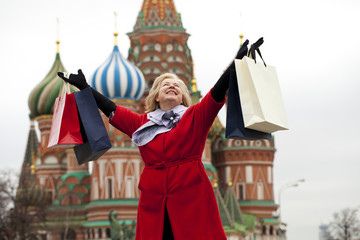 Fototapeta premium Mature happy woman with shopping bags