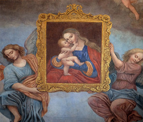 Fototapeta na wymiar Virgin Mary with baby Jesus, fresco in the Franciscan Church in Ljubljana, Slovenia