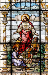 Fototapeta premium Jesus friend of the children, stained glass window in the Basilica of the Sacred Heart of Jesus in Zagreb, Croatia