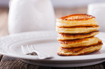 Pancake folded stack on wooden background.selective focus.