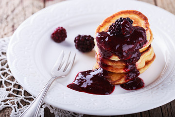 Pancakes with BlackBerry jam.selective focus.