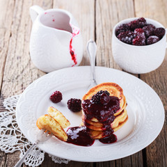 Pancakes with BlackBerry jam.selective focus.