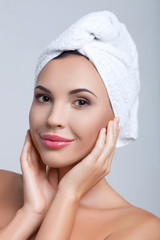 Cute young woman receiving skincare treatment