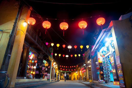Night view of a street in Hoi An, Vietnam. Hoi An is the World's Cultural heritage site, famous for mixed cultures and architecture.