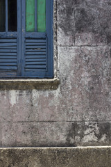 Composition of an old window and old wall